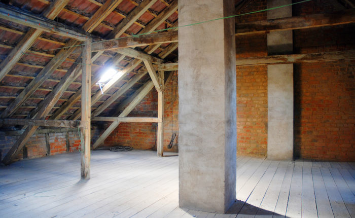 Clean, empty attic in a home waiting for renovation